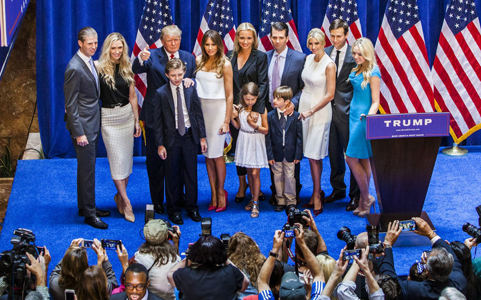 Donald Trump and his family posing for a picture.