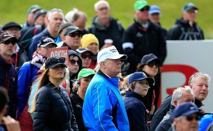 Donald Trump and Baron Trump along with Melania Trump witnessing a Golf match.