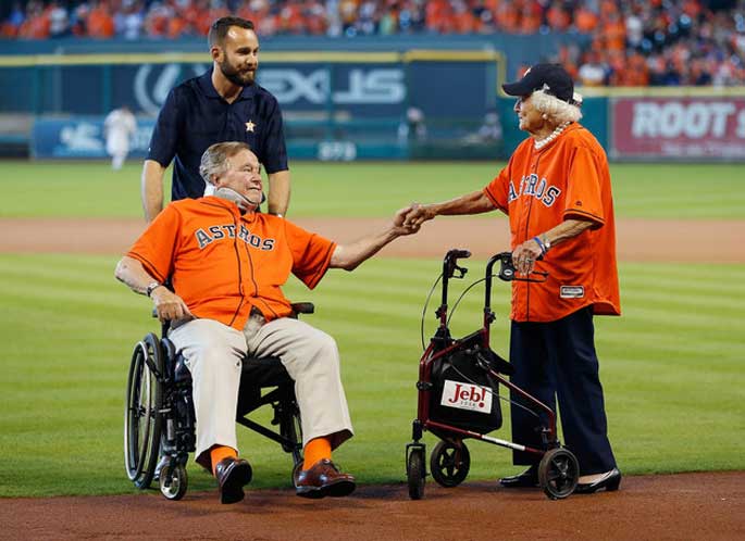 Papa Bush and Barbara Bush holding hand. 72 years of marriage and they are still in love as they first met.