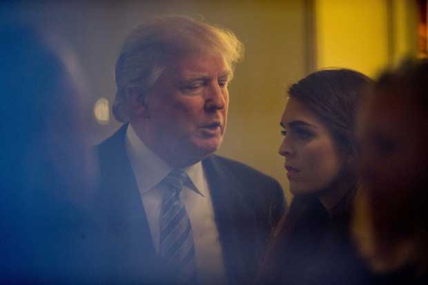 Hope Hicks listening to President Donald Trump in conference.