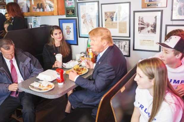 Donald Trump and Hope Hicks having dinner.