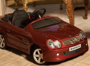 Barron Trump's red convertible toy; the licence plate has his name on it.