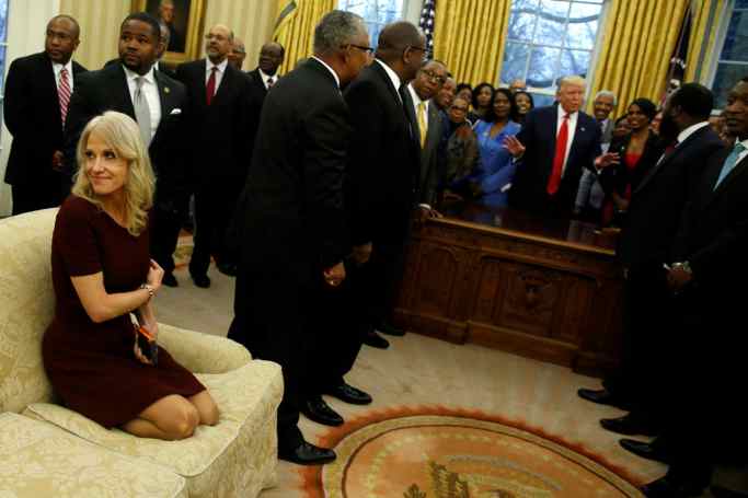 Kelyanne Conway in Knee bending position in White House Sofa.