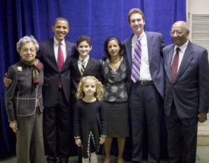 Barack Obama poses with Susan Rice and her family after nominating her to be U.S. Representative to the United Nations at a Chicago news conference .