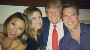 Natalie Morales with Donald Trump in the Miss Universe pageant dinner.