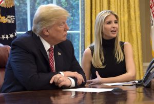 U.S. President Donald Trump listens while his daughter Ivanka speaks during a video conference with NASA astronauts