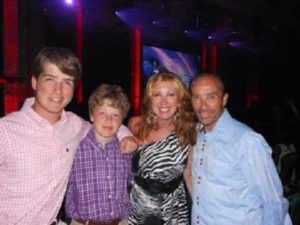Lee Greenwood with his wife and two children.