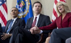 Former FBI director James Comey with his wife Patricia and 44th US President Barrack Obama.