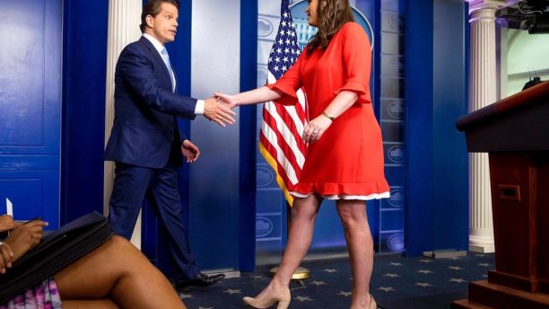 Sarah Huckabee shaking hand with Anthony Scaramucci in White House.